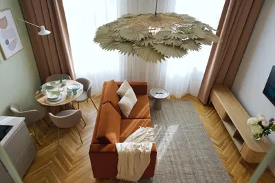 a living room with a couch and a table at Luxemi Apartments I City Center Premium Studio in Prague