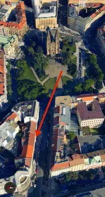 an aerial view of a building with a red arrow at Best location in Prague! 4 bedrooms and super host! in Prague