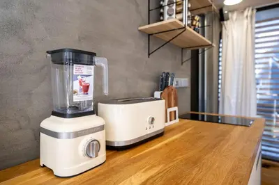 a blender sitting on top of a counter at Hausboat Holešovice in Prague