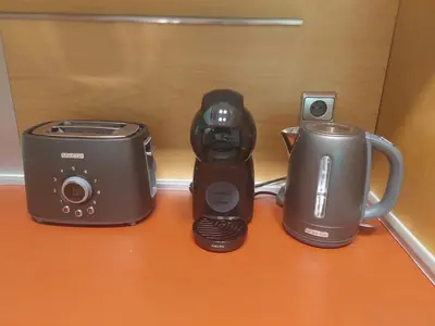 a counter with a blender and a toaster on it at Apartmán IRIS Poděbrady in Poděbrady