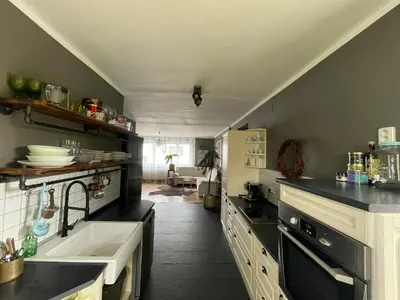 a kitchen with a sink and a counter top at Good Times in Prague