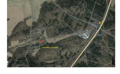 a map of a road with a red spot at Rekreační dům in Dobříš