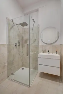a bathroom with a shower and a sink at Prague Milada & Heaven Home Apartment in Prague