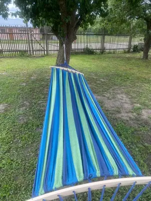a blue hammock with a tree in a yard at Doma na Lipníku-private country house, homestay in Lipník
