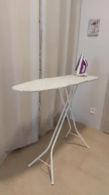 a white marble table with a laptop on it at Apartmány U Obory in Nechánice