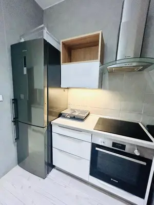 a kitchen with a stove and a refrigerator at Modern Spacious Apartment in center Prague in Prague