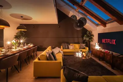 a living room with couches and tables in a room at AC Luxury Loft Friends & Family Edition in Prague