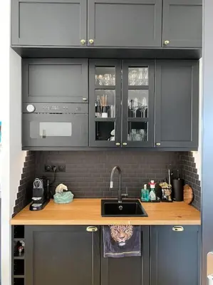 a kitchen with a sink and a counter top at Romantic Terrace Studio in Karlín in Prague