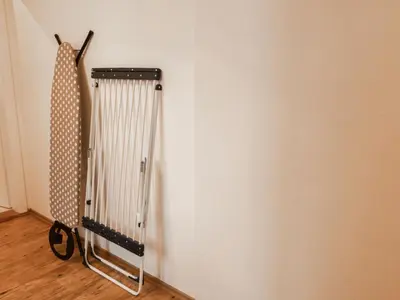 a pair of scissors next to a white wall at Apartment Art Lounge by Interhome in Prague