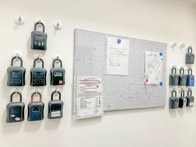 a wall with a bunch of cell phones on it at Stylish Apartment Next To Wenceslas Square in Prague