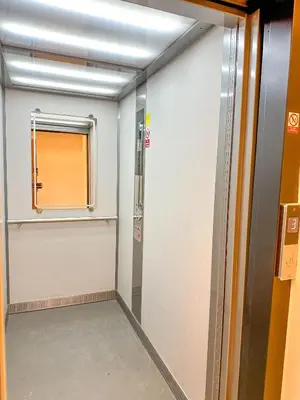 a hallway with a door and a window in a room at Stylish Apartment Next To Wenceslas Square in Prague