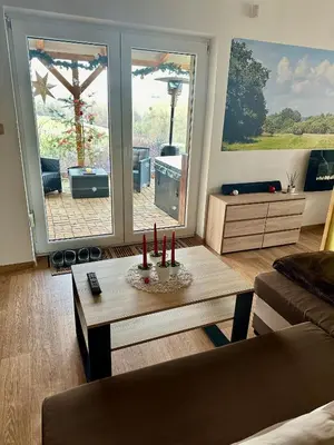 a living room with a couch and a coffee table at Dolpo 5 in Benešov