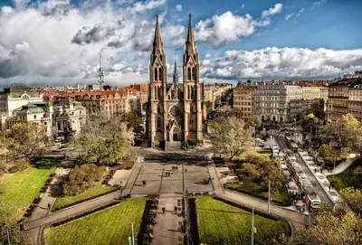 a large church with two towers in a city at Fantastic location! SUPERHOST 5 STAR in Prague