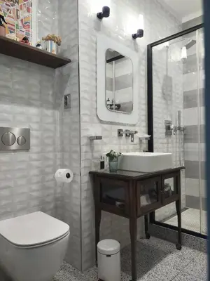 a bathroom with a sink and a toilet and a mirror at Spacious Apartment in Central Prague 3 bedrooms, 6 people in Prague