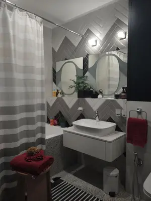 a bathroom with a sink and two mirrors at Spacious Apartment in Central Prague 3 bedrooms, 6 people in Prague