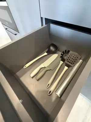 a drawer full of kitchen utensils in a cabinet at IOS ArtPrg in Prague