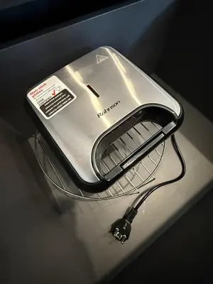 a toaster sitting on top of a shelf at IOS ArtPrg in Prague