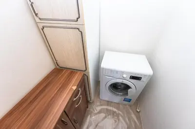 a washer and dryer in a small room at Apartment Charkovska 18 in Prague