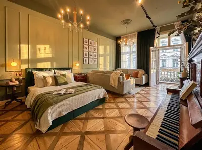 a living room with a couch and a table at TurnKey I Antonin Dvorak Apartments in Prague