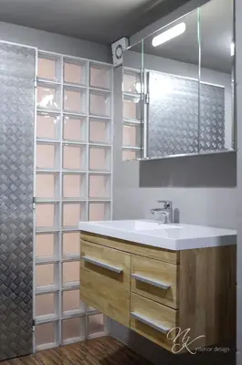 a bathroom with a sink and a shower at Design Apartment Havelska in Prague