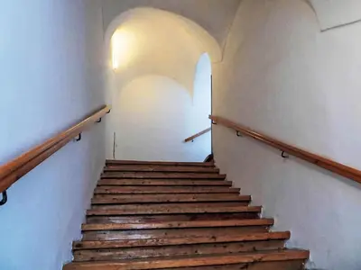 a stairway with wooden steps in a building at Apartment Old Town home-5 by Interhome in Prague