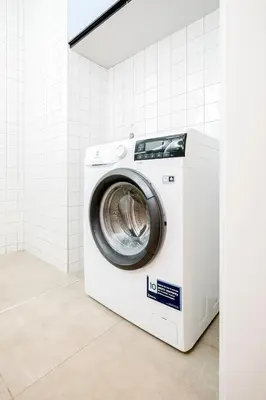 a washing machine sitting in a room at Prague Days - 3BDR Apartments with Terrace in Residential Vinohrady in Prague