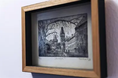 a drawing of a city in a wooden picture frame at Charming Apartment in Historic Old Town in Prague