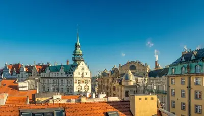 a view of a city with buildings and roofs at 4 Arts Apartments by Adrez in Prague