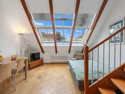 a bedroom with a bed and a desk in a room at Apartment O21 by Interhome in Prague