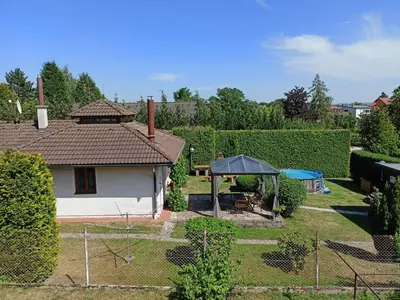 a backyard with a house and a gazebo at Villa Petříkov by Interhome in Petříkov