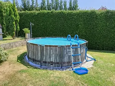 a small pool in a yard with at Villa Petříkov by Interhome in Petříkov