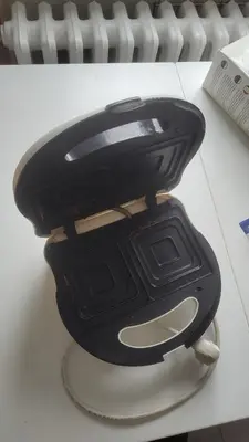 a black toilet sitting on top of a table at Nomads room nearest forest Kamýk in Prague