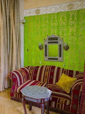 a living room with a couch and a table at 1000 and 1 night in Prague city center in Prague