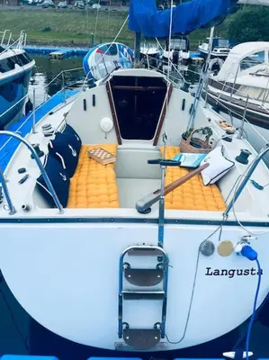 a boat is docked in a dock in the water at Ubytování na plachetnici in Živohošť