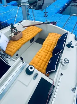 a boat with two rows of orange coils on it at Ubytování na plachetnici in Živohošť