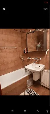 a bathroom with a sink and a bath tub and a sink at Chalupa pod hradem Talmberk in Samopše