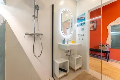 a bathroom with a shower and a sink at Classy Loft Apartment in the City Center of Prague in Prague