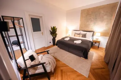 a bedroom with a bed and a ladder at 3BR & 2,5Bath Heaven of Harmony 2 Theater VIEW in Prague