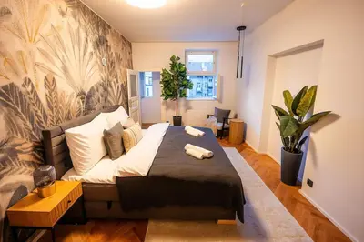 a bedroom with a large bed in a room at 3BR & 2,5Bath Heaven of Harmony 2 Theater VIEW in Prague