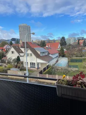 a view of a city with houses and a train track at Flat with heart and art nearby centre of the Prague in Prague