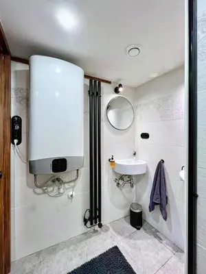 a bathroom with a sink and a mirror at WOW MiniLoft, near Wenceslas Square, city centre, fast wifi in Prague