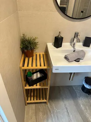 a bathroom with a sink and a mirror at LofT apartments Prague in Prague