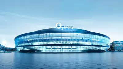 a large glass building with a sign on it at NEW Apartment - O2 Arena Prague with parking in Prague