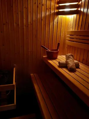 a basket sitting on top of a wooden table at Cosy chalet with wellness in Mirošovice
