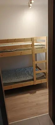 two sets of bunk beds in a room at Brand new two room apartment #23 with FREE parking in the city center in Prague
