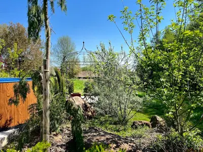 a view of a garden from a roof at Garden Residence - The Nest in Drahobudice