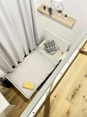 a bed in the floor of a room at Entire unit in the center of Prague in Prague