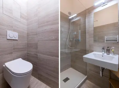 two pictures of a bathroom with a toilet and a sink at Encore Boutique Residence by Dwellfort in Prague