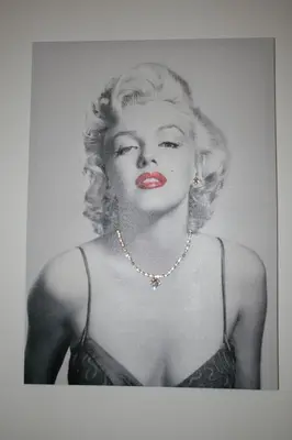 a drawing of a woman wearing a necklace at Apartment Marilyn in Prague