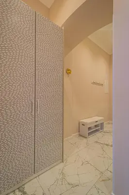 a bathroom with a walk in shower with a glass door at 3BDR Elegance Deco Downtown Flat in Prague